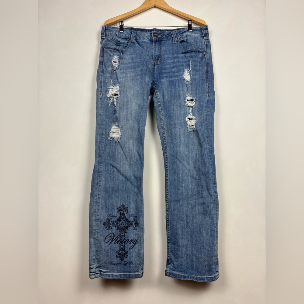 Women’s Light Blue Distressed Jeans with Embroidered Detail